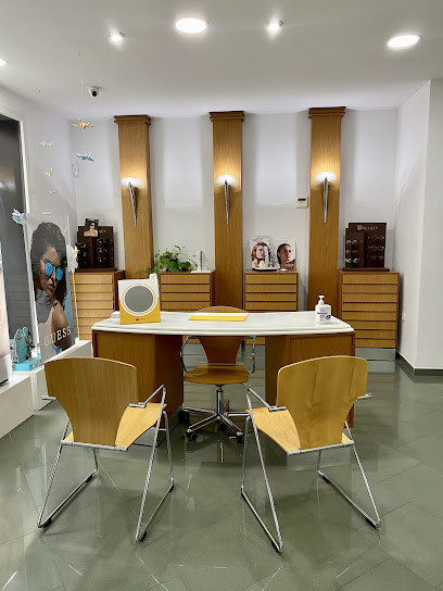 Baza - OPTICA ALMERIA - Óptica